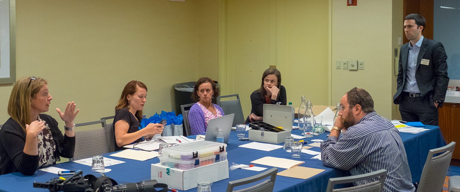 Chordoma Foundation staff sitting at a table